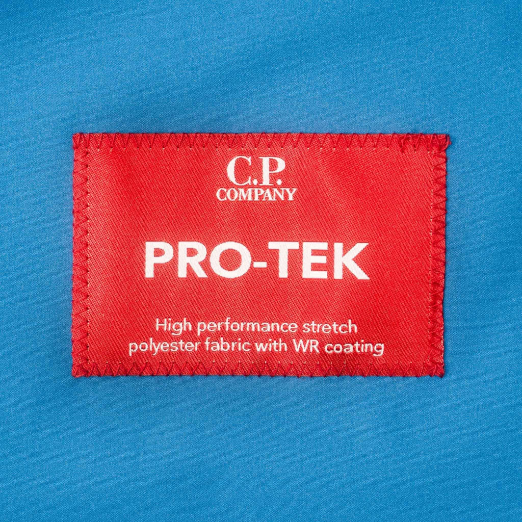 C.P. Company Pro-Tek Lens Hooded Jacket in Ink Blue